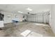 Spacious garage with ample storage shelving and room for two cars at 756 Bay Dr, New Smyrna Beach, FL 32168