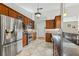 Modern kitchen featuring stainless steel appliances and ample cabinet space at 756 Bay Dr, New Smyrna Beach, FL 32168