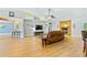 Bright and airy living room with hardwood floors and a cozy seating area at 756 Bay Dr, New Smyrna Beach, FL 32168