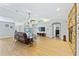 Spacious living room with a fireplace and hardwood floors at 756 Bay Dr, New Smyrna Beach, FL 32168