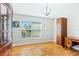 Home office with built-in cabinetry and hardwood floors at 756 Bay Dr, New Smyrna Beach, FL 32168