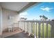 Cozy balcony with seating and ocean views at 3663 S Atlantic Ave # 21C, New Smyrna Beach, FL 32169