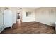 Cozy bedroom with wood-look flooring and neutral decor at 3663 S Atlantic Ave # 21C, New Smyrna Beach, FL 32169
