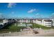 Beautiful condo complex with manicured grounds and community pool at 3663 S Atlantic Ave # 21C, New Smyrna Beach, FL 32169
