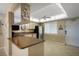 Kitchen featuring stainless steel appliances and a breakfast bar at 3663 S Atlantic Ave # 21C, New Smyrna Beach, FL 32169