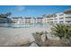 Beautiful community pool area with lounge chairs and manicured landscaping for relaxing and enjoying the sun at 3663 S Atlantic Ave # 21C, New Smyrna Beach, FL 32169
