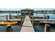 A beautiful dock and gazebo on a lake; perfect for boating, kayaking and enjoying peaceful waterfront views at 788 E Michigan St # 18, Orlando, FL 32806