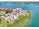 Aerial view of waterfront condo community with lush landscaping at 434 Bouchelle Dr # 304, New Smyrna Beach, FL 32169