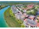 Aerial view of waterfront condo community with boat slips and waterway at 434 Bouchelle Dr # 304, New Smyrna Beach, FL 32169