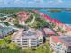 Aerial view of waterfront condo community with parking and pool at 434 Bouchelle Dr # 304, New Smyrna Beach, FL 32169