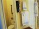 Well-lit bathroom with towels, decor, and a shower/tub combination at 434 Bouchelle Dr # 304, New Smyrna Beach, FL 32169