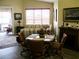 Inviting dining area with a window view, adjacent to the living room at 434 Bouchelle Dr # 304, New Smyrna Beach, FL 32169