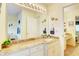 Bathroom with granite countertops and a double vanity at 2051 Cornell Pl, Port Orange, FL 32128