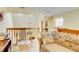 Spacious loft with a couch, work area, and skylight at 2051 Cornell Pl, Port Orange, FL 32128