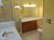 Bright bathroom features a shower, vanity, and granite countertop at 714 Fox Tail Ct, New Smyrna Beach, FL 32168
