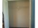 An organized closet with bifold doors and single shelf providing ample storage space at 714 Fox Tail Ct, New Smyrna Beach, FL 32168