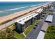 Oceanfront condo complex with private parking, steps to sandy beaches and ocean views from every unit at 3180 Ocean Shore Blvd # 208, Ormond Beach, FL 32176