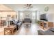 Open-concept living room featuring modern furnishings, neutral decor, and seamless flow to the kitchen at 3365 Meleto Blvd, New Smyrna Beach, FL 32168