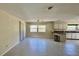 Open living and dining area featuring tile flooring and abundant natural light at 1119 Edith Dr, Daytona Beach, FL 32117