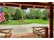 Inviting outdoor living with a view of the expansive lawn and meticulously landscaped garden at 2536 Paige Ave, New Smyrna Beach, FL 32168