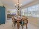 The dining room leads to an airy living room with backyard views at 1949 Bayview Dr, New Smyrna Beach, FL 32168