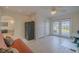 Flex room with a sleeper sofa and french door access to the backyard at 1949 Bayview Dr, New Smyrna Beach, FL 32168