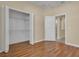 Bedroom showcases hardwood floors, and closet at 306 Coral Reef Way, Daytona Beach, FL 32124