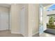 Inviting entryway features tile flooring, coat closet, and a stylish light-blue front door at 306 Coral Reef Way, Daytona Beach, FL 32124