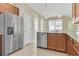 Updated kitchen includes stainless steel appliances and granite countertops at 306 Coral Reef Way, Daytona Beach, FL 32124