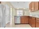 Updated kitchen features granite countertops and stainless steel appliances at 306 Coral Reef Way, Daytona Beach, FL 32124