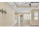 Open living room with fan and neutral-toned walls and tile floors at 306 Coral Reef Way, Daytona Beach, FL 32124