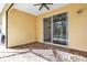 Covered patio featuring brick floors at 306 Coral Reef Way, Daytona Beach, FL 32124