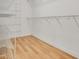 Walk-in closet offers wood floor and a lot of wire shelving space at 306 Coral Reef Way, Daytona Beach, FL 32124