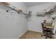 The walk-in closet with wire shelving and a small desk at 5300 S Atlantic Ave # 8-303, New Smyrna Beach, FL 32169