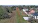 Aerial view of property with taxiway access and surrounding homes at 1428 Willow Oak Dr, Edgewater, FL 32132