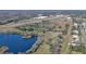 Property view showing location near a lake and an airport at 1428 Willow Oak Dr, Edgewater, FL 32132