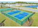 Community pickleball courts and basketball court with lake views offer an active lifestyle at 5226 Hophorn Dr, Edgewater, FL 32141