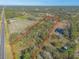 Aerial view of property highlighting lot boundaries at 1035 S State Road 415, New Smyrna Beach, FL 32168