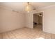 Bright dining room with tile floors and chandelier at 1035 S State Road 415, New Smyrna Beach, FL 32168