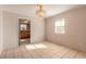 Dining room with tile floors and chandelier, kitchen view at 1035 S State Road 415, New Smyrna Beach, FL 32168