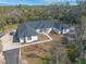 New construction home with pool; surrounded by lush Florida landscape at 1371 Melonie Trl, New Smyrna Beach, FL 32168