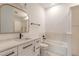 Bathroom with a bathtub, toilet and modern vanity at 1371 Melonie Trl, New Smyrna Beach, FL 32168