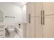 Bathroom with a bathtub, toilet and built-in storage at 1371 Melonie Trl, New Smyrna Beach, FL 32168