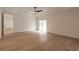 Bright bedroom with hardwood floors and access to the backyard at 1371 Melonie Trl, New Smyrna Beach, FL 32168