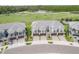 Luxury townhouses with two-car garages and landscaped yards, near a golf course at 2884 Isles Way, New Smyrna Beach, FL 32168