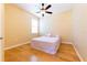 Bedroom with hardwood floors and ceiling fan at 3447 Poneta Ave, New Smyrna Beach, FL 32168