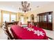 Elegant dining room showcasing a formal table setting at 3447 Poneta Ave, New Smyrna Beach, FL 32168