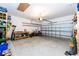 Spacious garage with ample storage shelving and workbench at 3447 Poneta Ave, New Smyrna Beach, FL 32168