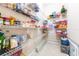 Well-organized pantry with ample shelving for storage at 3447 Poneta Ave, New Smyrna Beach, FL 32168