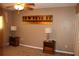 Carpeted bedroom featuring a ceiling fan and warm lighting creating a relaxing retreat at 400 Oakridge Blvd # 6, Daytona Beach, FL 32118
